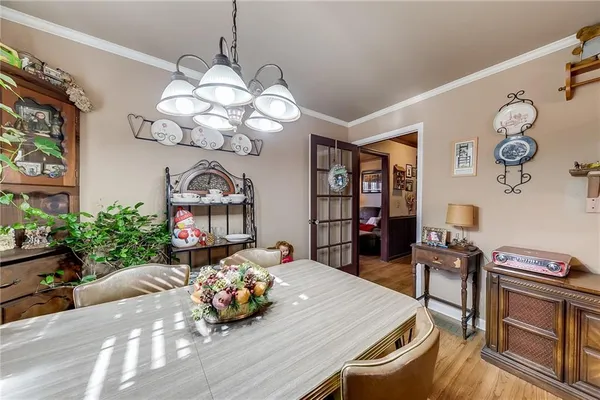 a bedroom with a bed window and couch