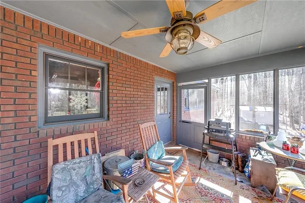 a view of backyard with patio