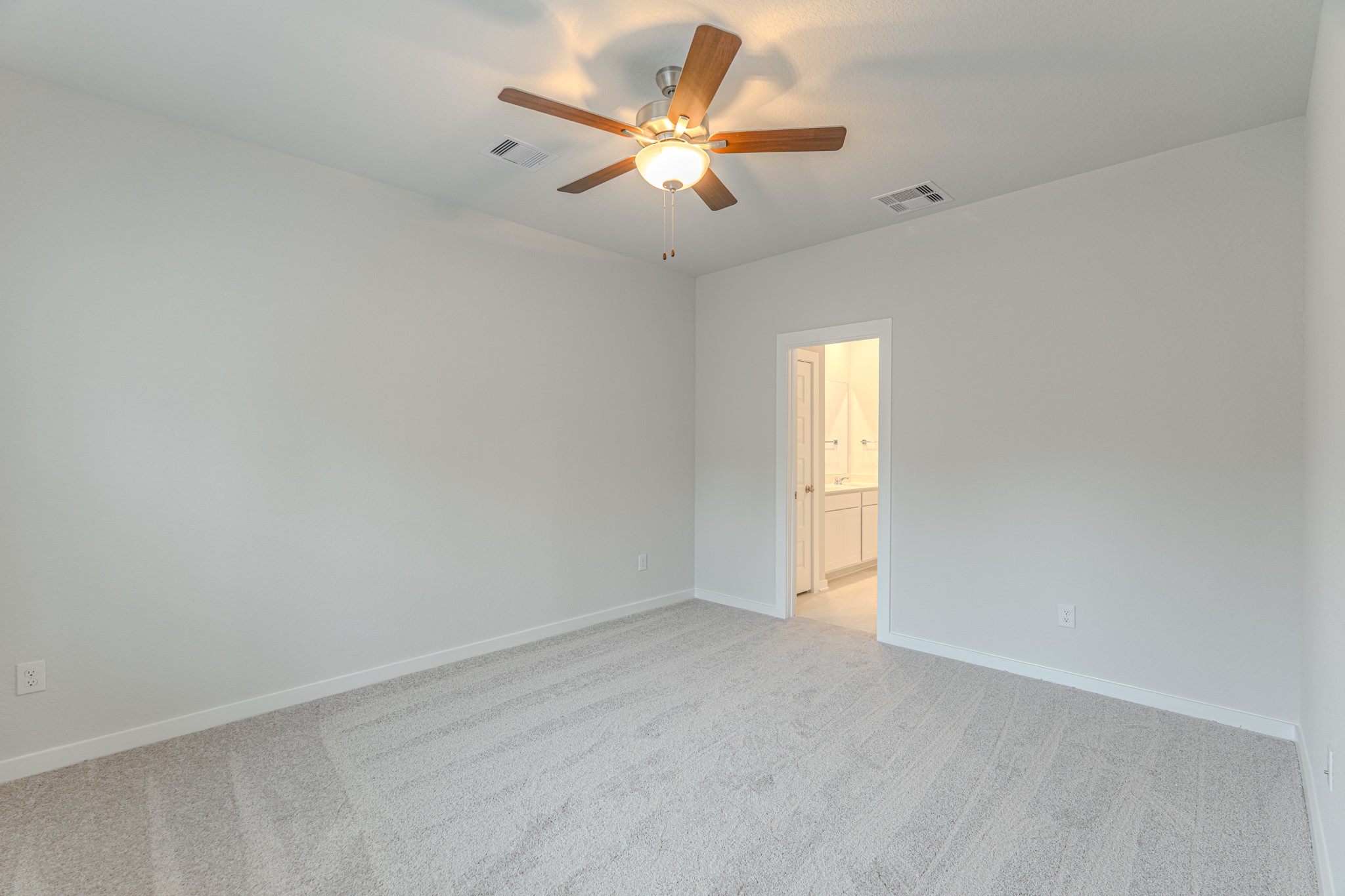 8570 Blueberry Ash Street Magnolia, TX 77354 - Photo 15 of 30 wooden floor in an empty room with a window