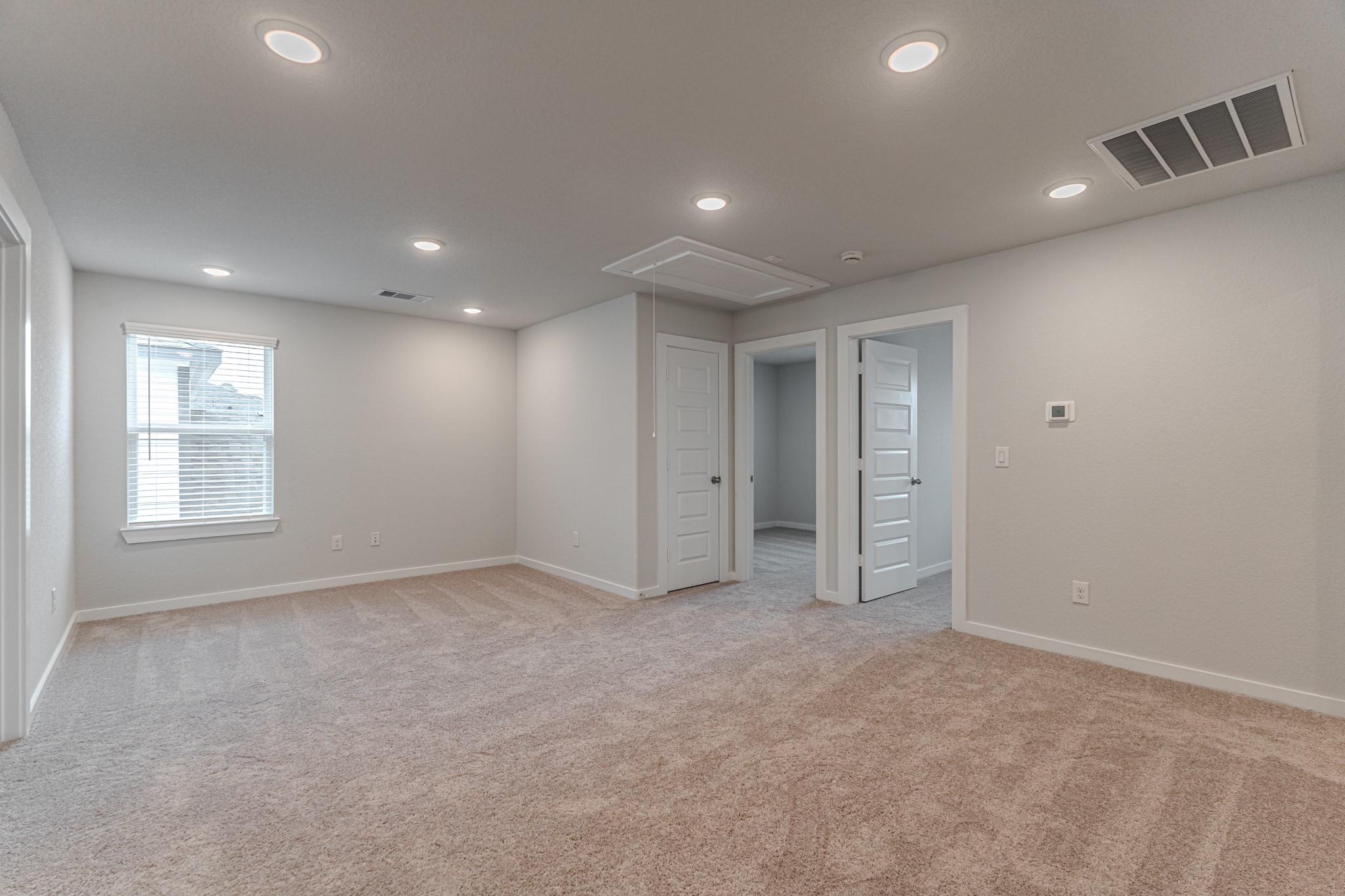 8570 Blueberry Ash Street Magnolia, TX 77354 - Photo 23 of 30 a view of an empty room with windows