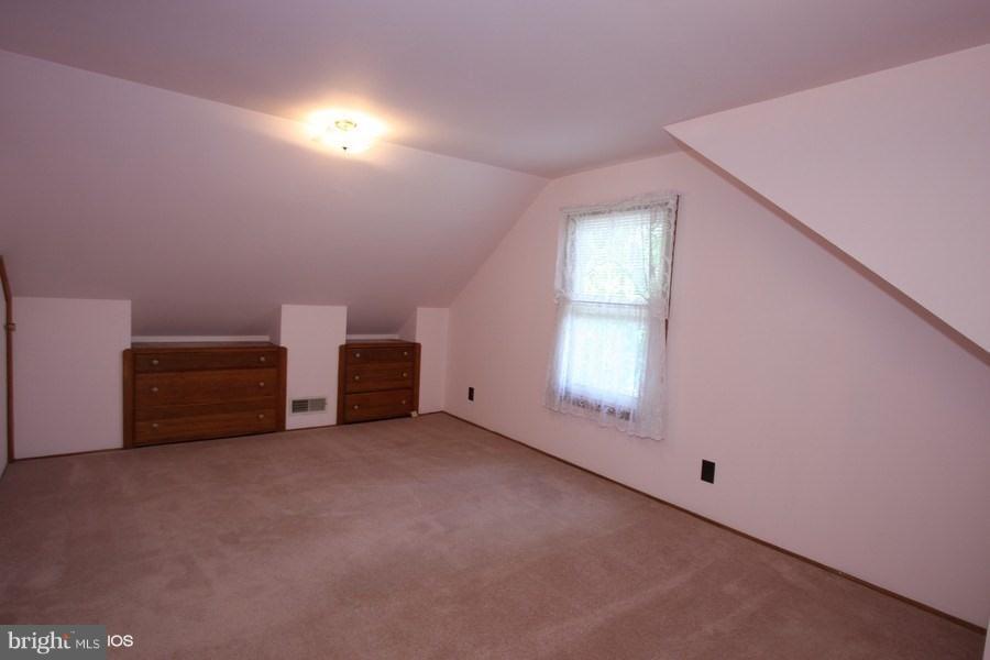 412 West Maple Road Linthicum Heights, MD 21090 - Photo 11 of 28 a view of an empty room with a window