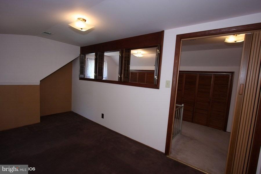 412 West Maple Road Linthicum Heights, MD 21090 - Photo 14 of 28 wooden floor in an empty room