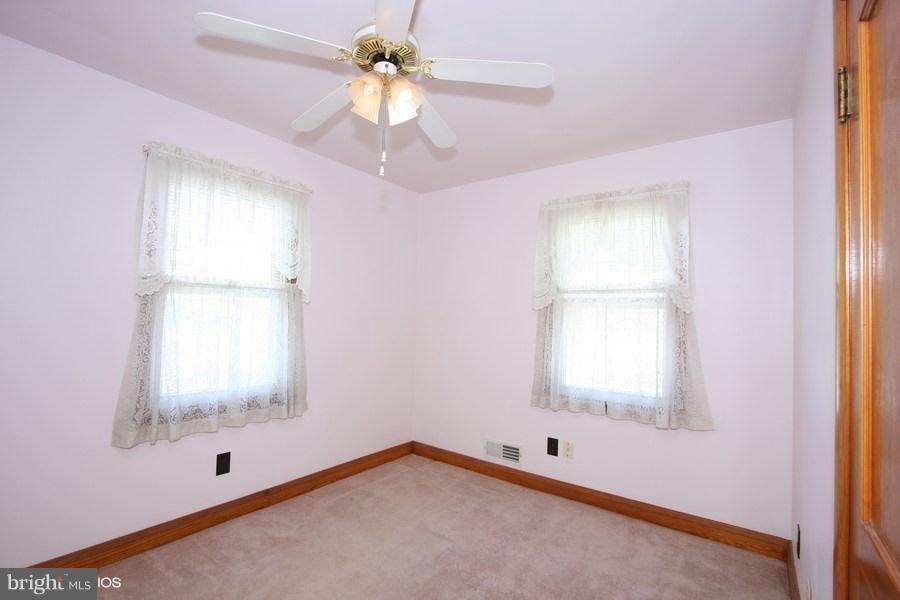 412 West Maple Road Linthicum Heights, MD 21090 - Photo 15 of 28 a view of empty room with window