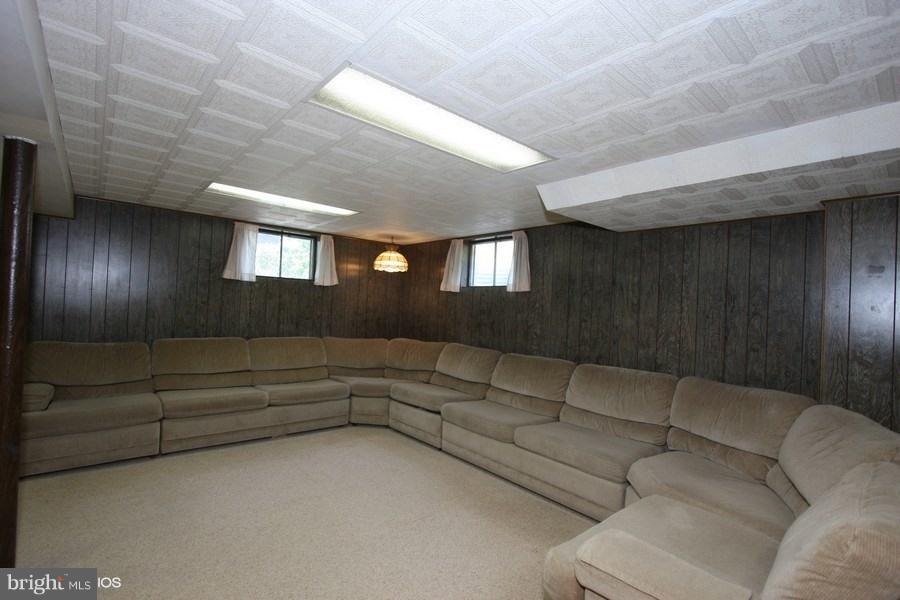 412 West Maple Road Linthicum Heights, MD 21090 - Photo 18 of 28 a living room with furniture and a window