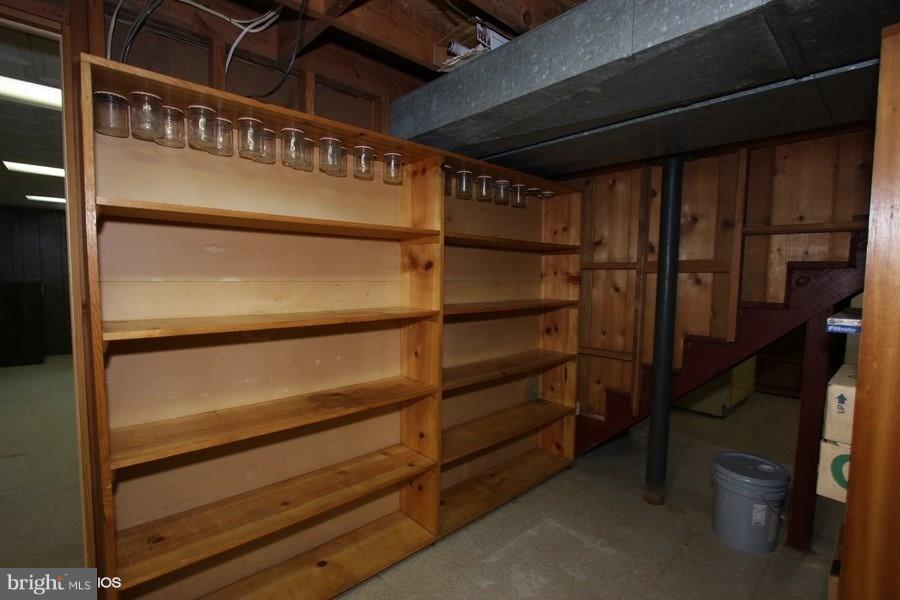 412 West Maple Road Linthicum Heights, MD 21090 - Photo 25 of 28 a view of walk in closet with empty racks