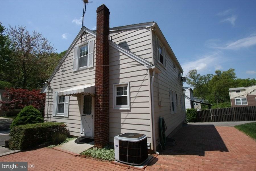 412 West Maple Road Linthicum Heights, MD 21090 - Photo 4 of 28 a front view of a house with a yard