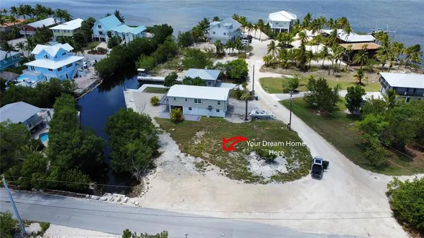 an aerial view of a house with a garden