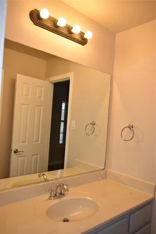 an empty room with windows and mountain view