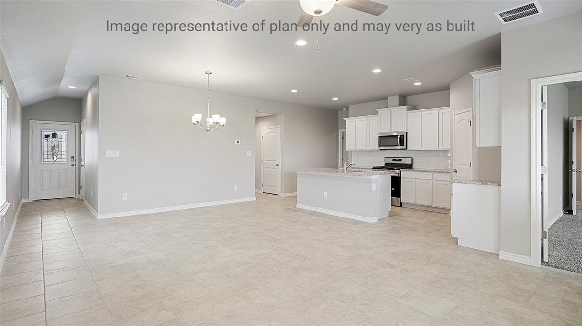 1411 Choctaw Road Sinton, TX 78387 - Photo 2 of 28 a view of a kitchen with kitchen island a sink stainless steel appliances and cabinets