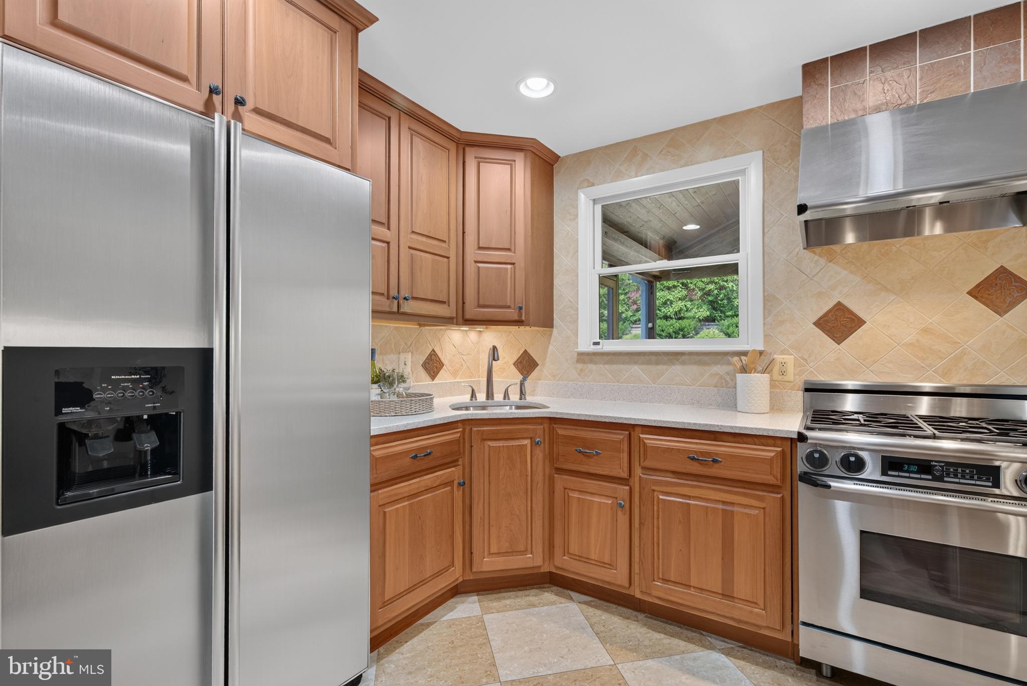 3 North Hilltop Road Baltimore, MD 21228 - Photo 11 of 34 Durable quartz counters. Recessed lights, wood cab