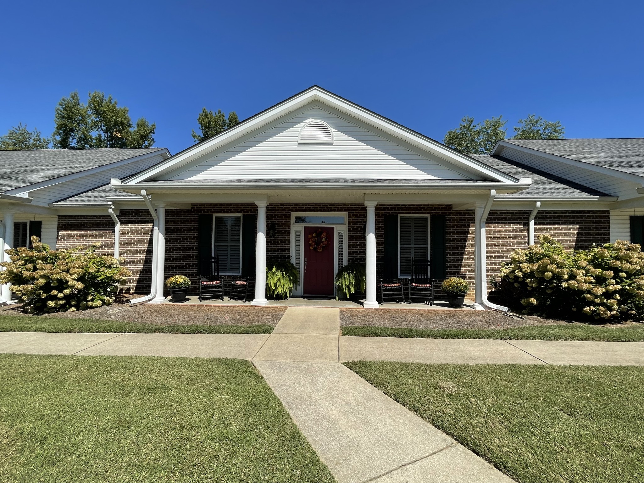705 Blackpatch Drive, Unit 8 Springfield, TN 37172 - Photo 2 of 28 a front view of a house with a yard