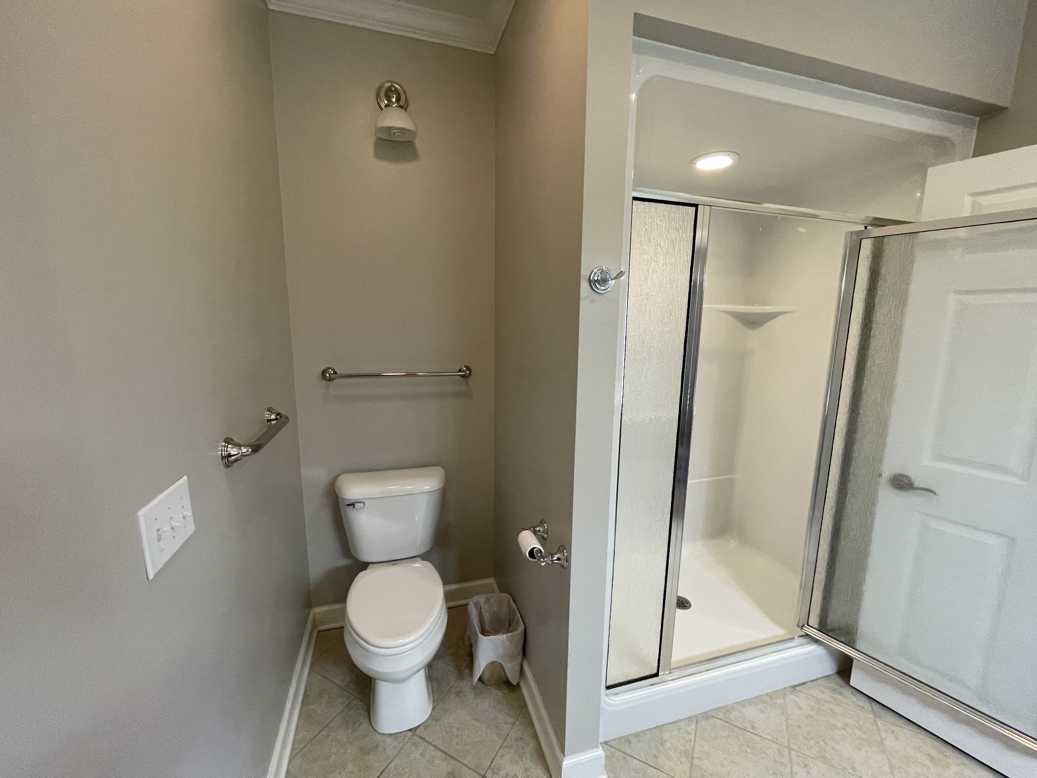 705 Blackpatch Drive, Unit 8 Springfield, TN 37172 - Photo 25 of 28 a bathroom with a toilet and a shower