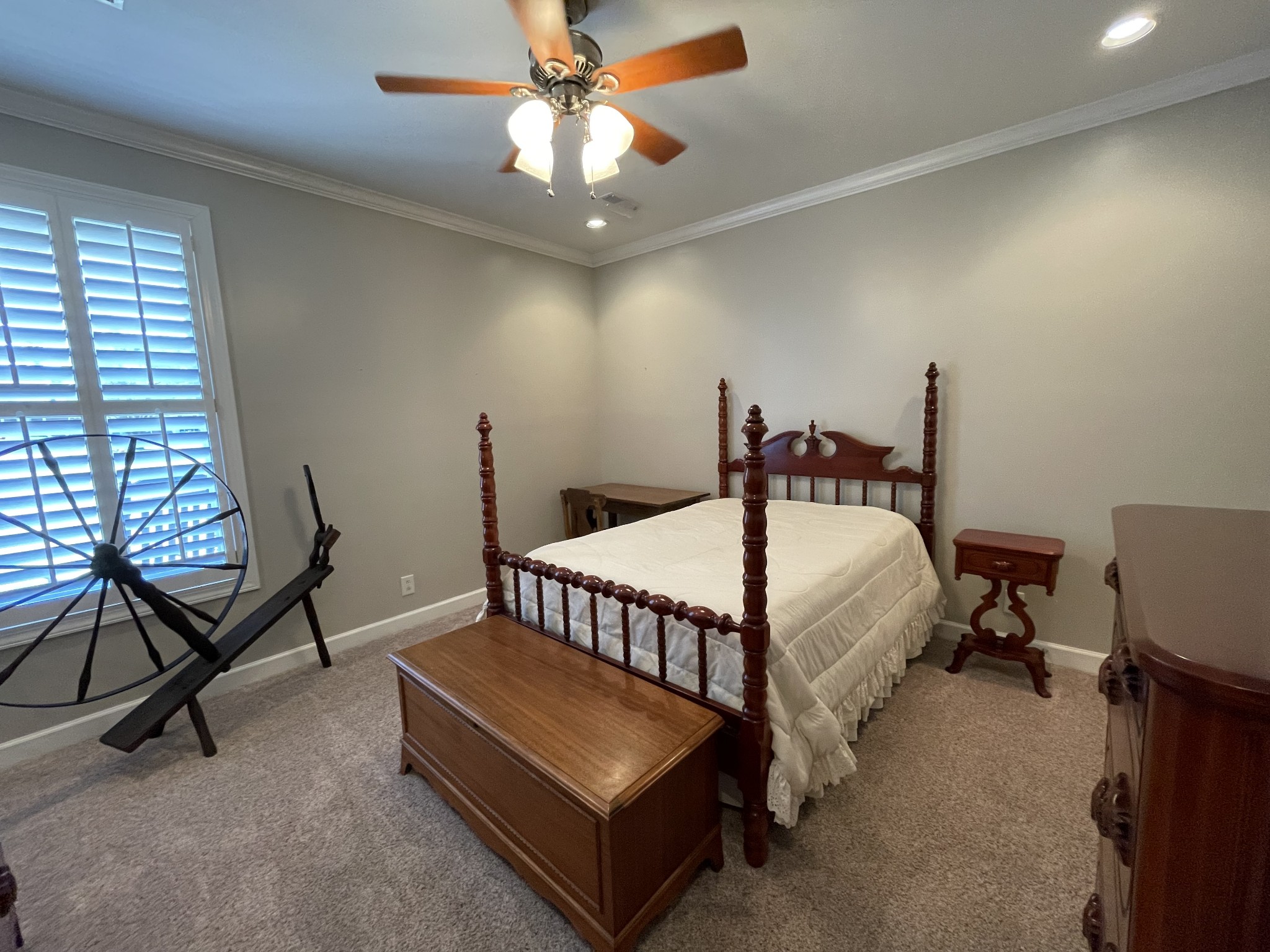 705 Blackpatch Drive, Unit 8 Springfield, TN 37172 - Photo 26 of 28 a bedroom with a bed and a chandelier