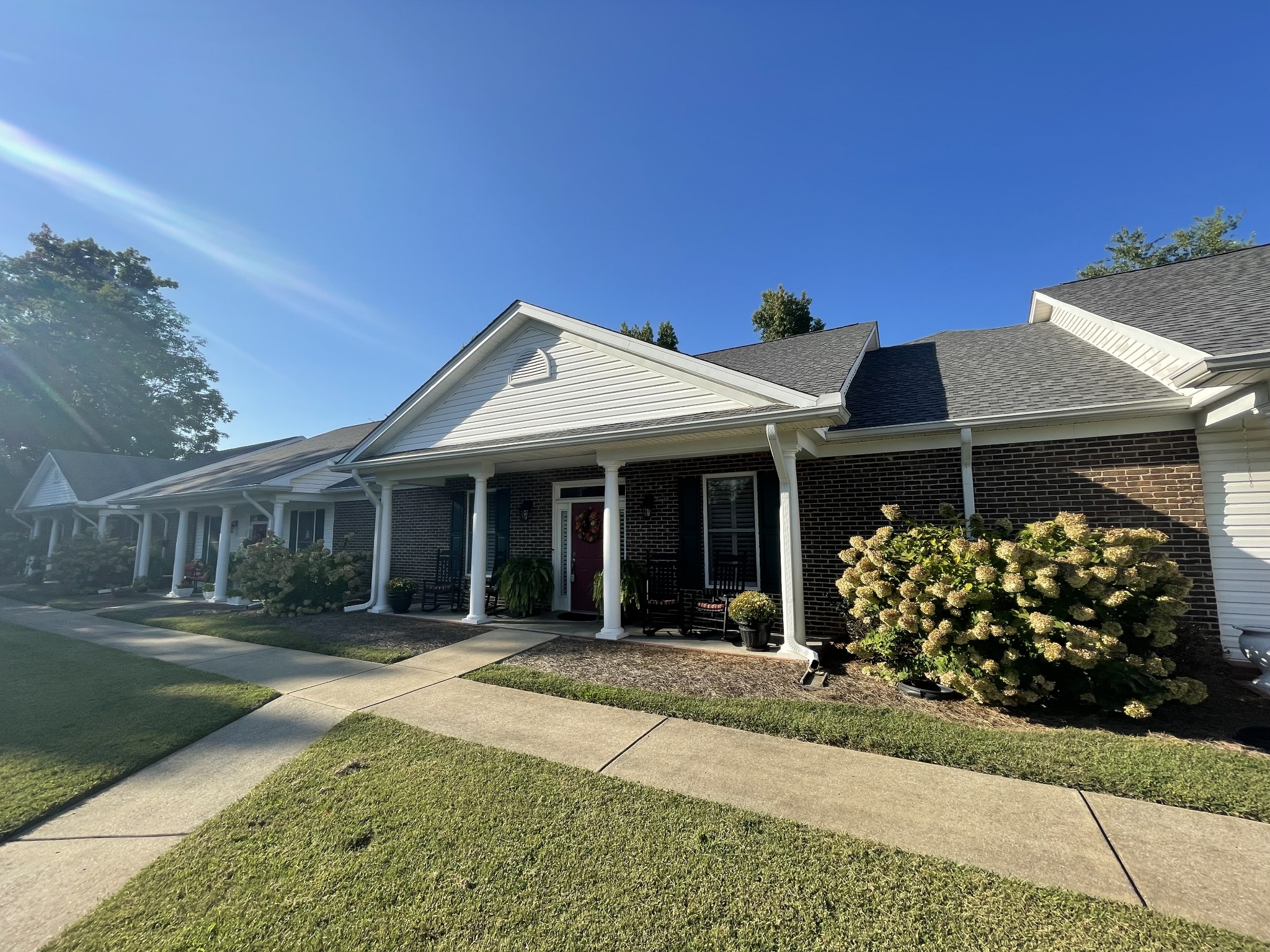 705 Blackpatch Drive, Unit 8 Springfield, TN 37172 - Photo 3 of 28 a front view of a house with garden