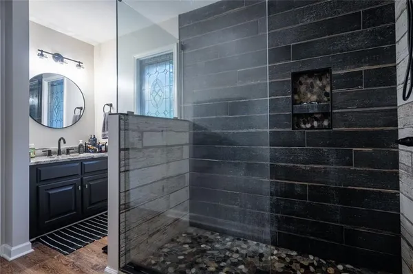 a bathroom with a sink and a mirror