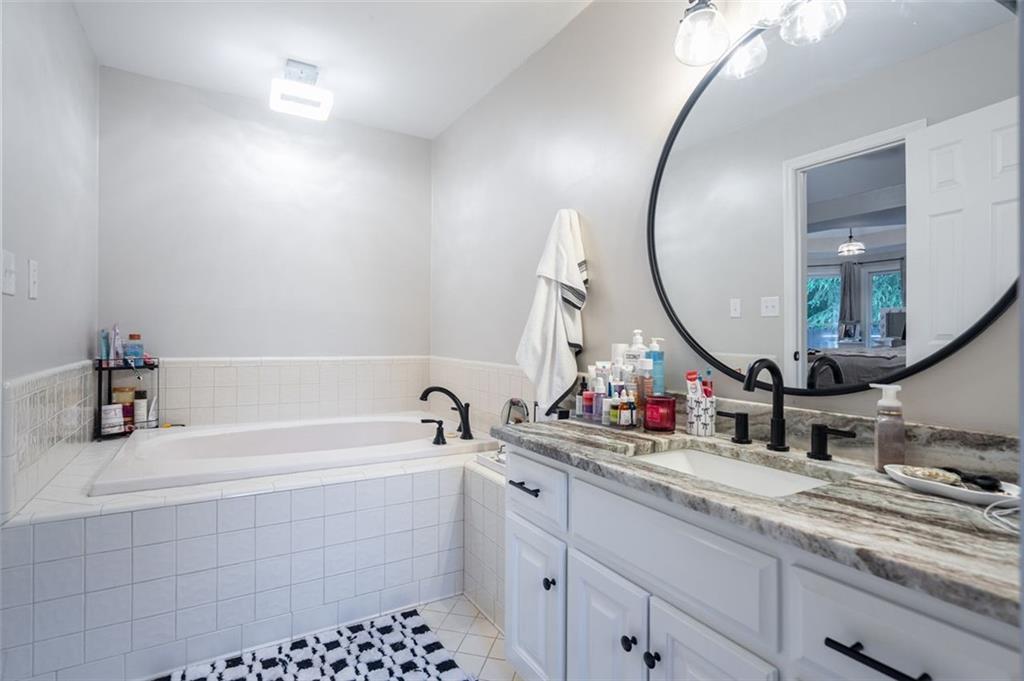 30 Westover Drive Southwest Rome, GA 30165 - Photo 22 of 51 a bathroom with a sink and a mirror