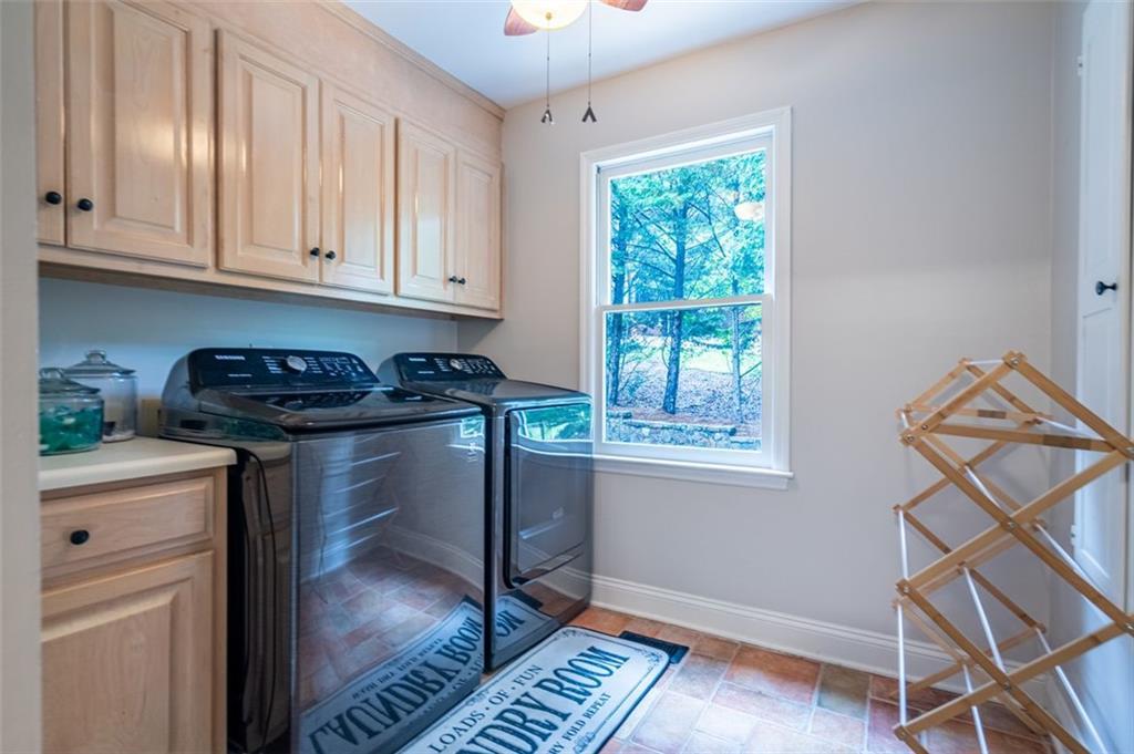 30 Westover Drive Southwest Rome, GA 30165 - Photo 28 of 51 a kitchen with a window a sink and cabinets