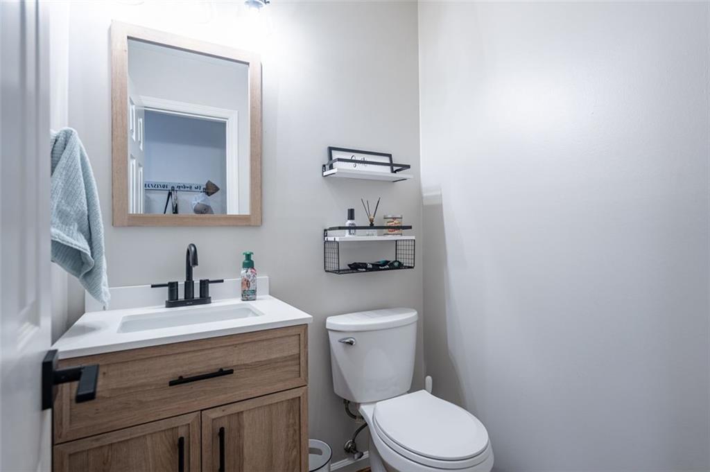 30 Westover Drive Southwest Rome, GA 30165 - Photo 29 of 51 a bathroom with a toilet sink and mirror