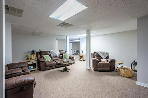 a living room with furniture and a couch