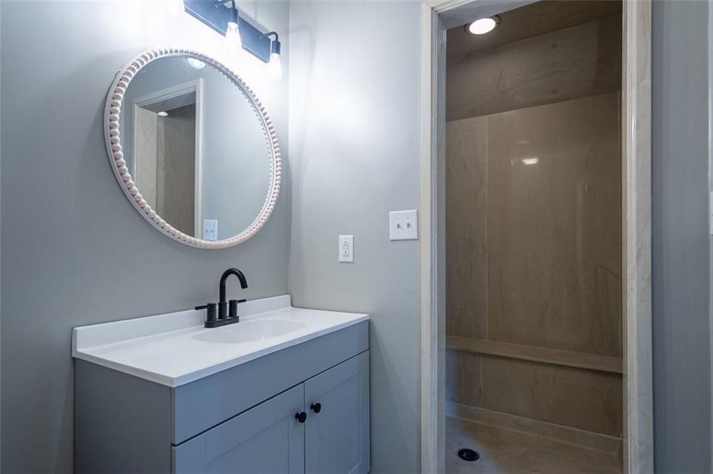 30 Westover Drive Southwest Rome, GA 30165 - Photo 40 of 51 a bathroom with a sink and a mirror