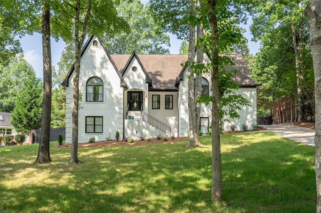 30 Westover Drive Southwest Rome, GA 30165 - Photo 49 of 51 a view of big house with a big yard potted plants and large tree