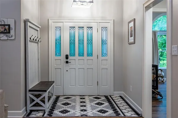 a room with a window and wooden floor