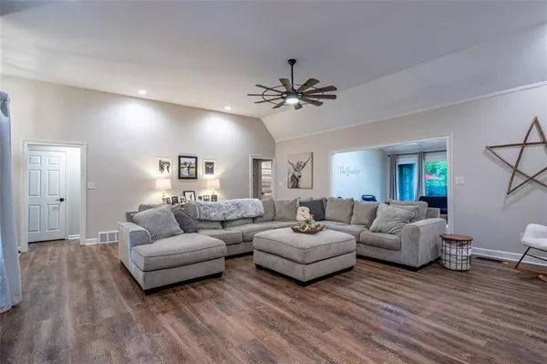 a living room with couches and a table