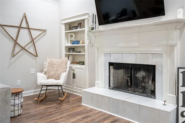 a living room with a couch and a fireplace