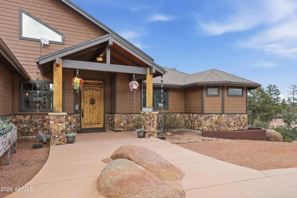 a front view of a house with a porch