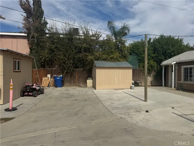 a house with trees in front of it