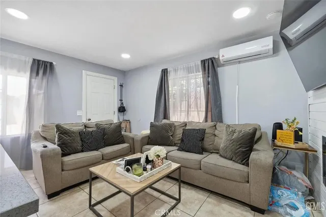 a living room with furniture and a couch