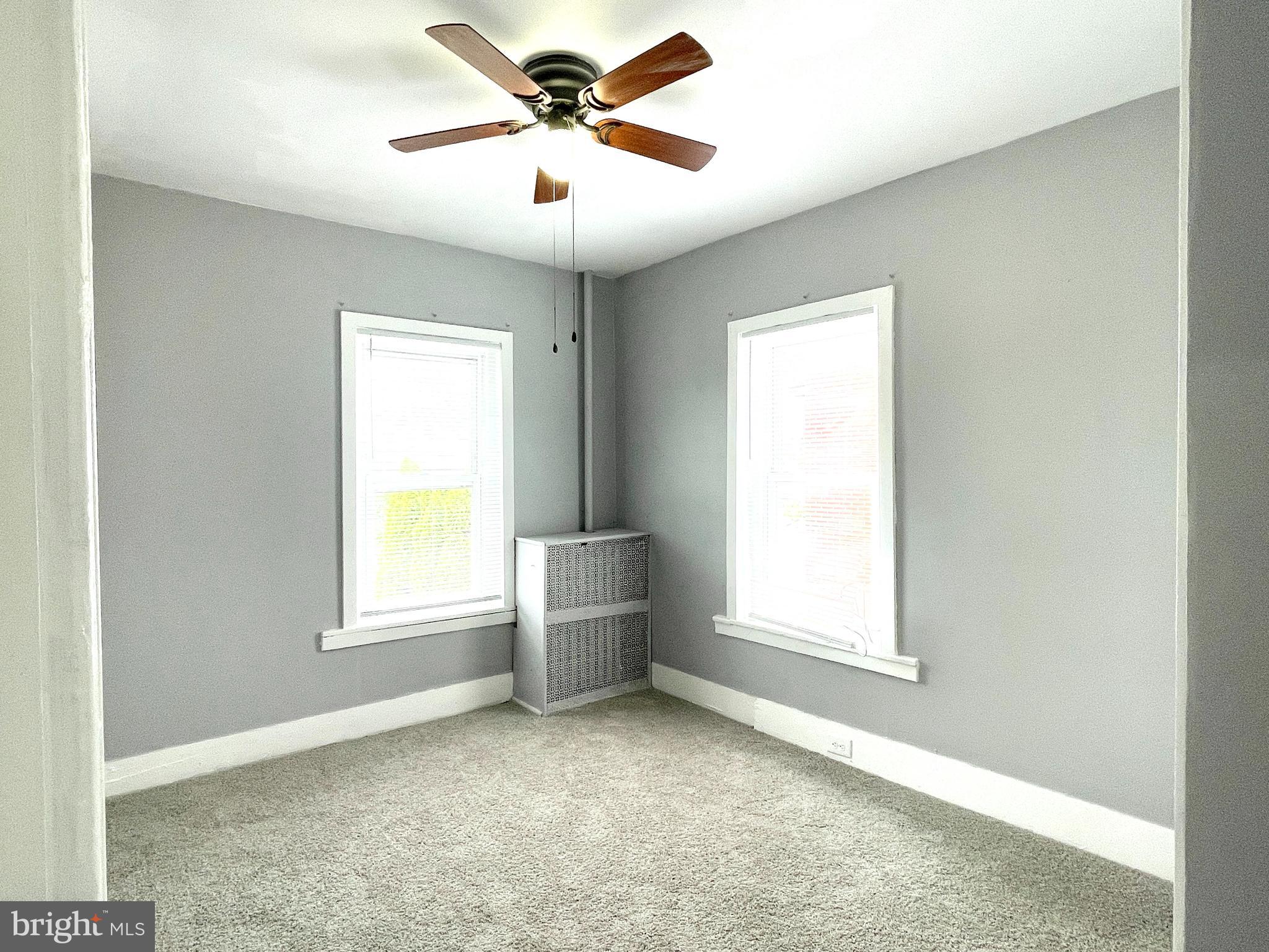 434 Pierce Street Lansdale, PA 19446 - Photo 11 of 28 an empty room with windows and fan