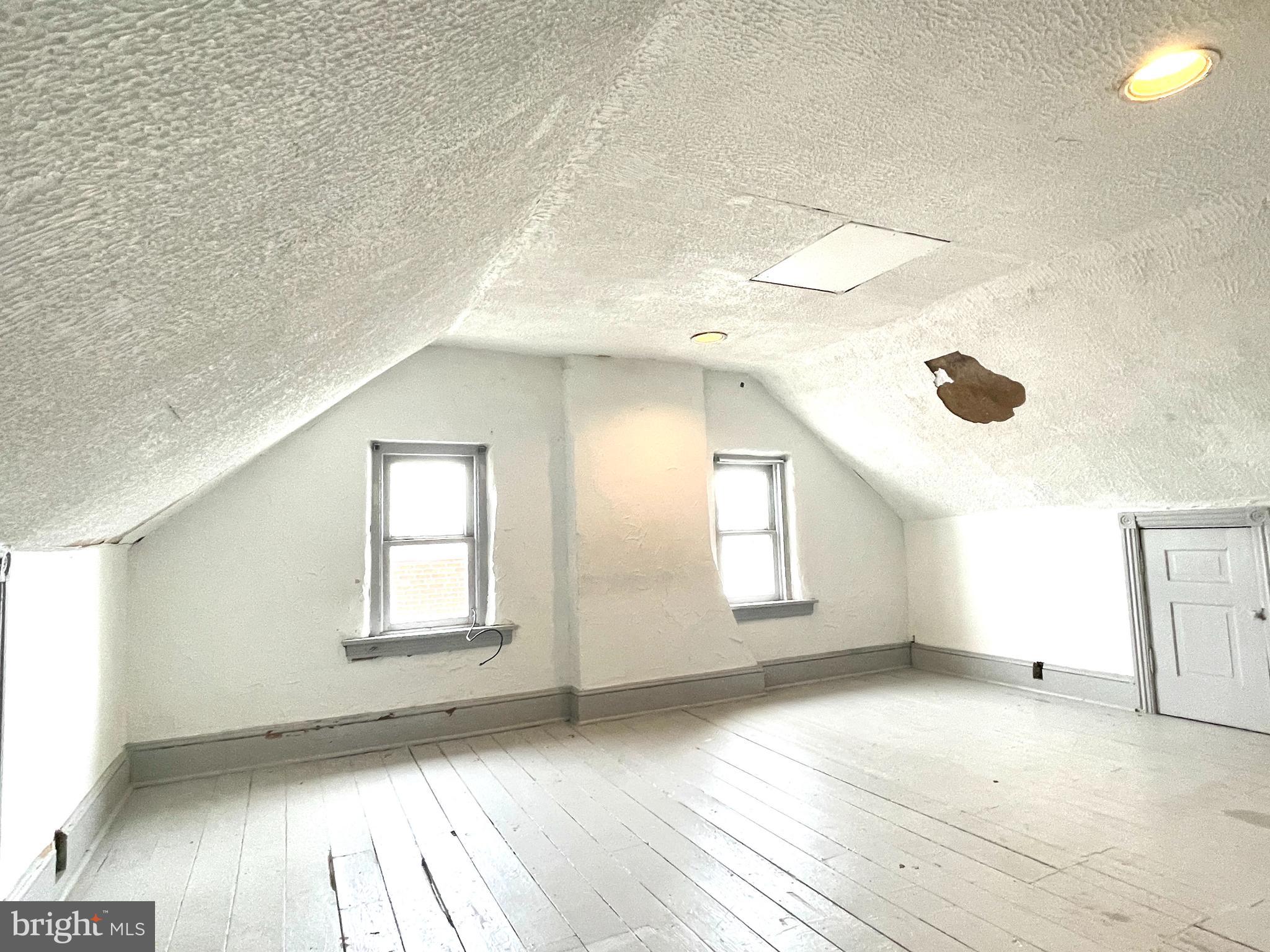 434 Pierce Street Lansdale, PA 19446 - Photo 20 of 28 an empty room with wooden floor and windows