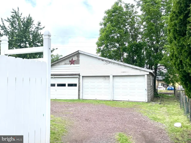 a house view with a backyard space