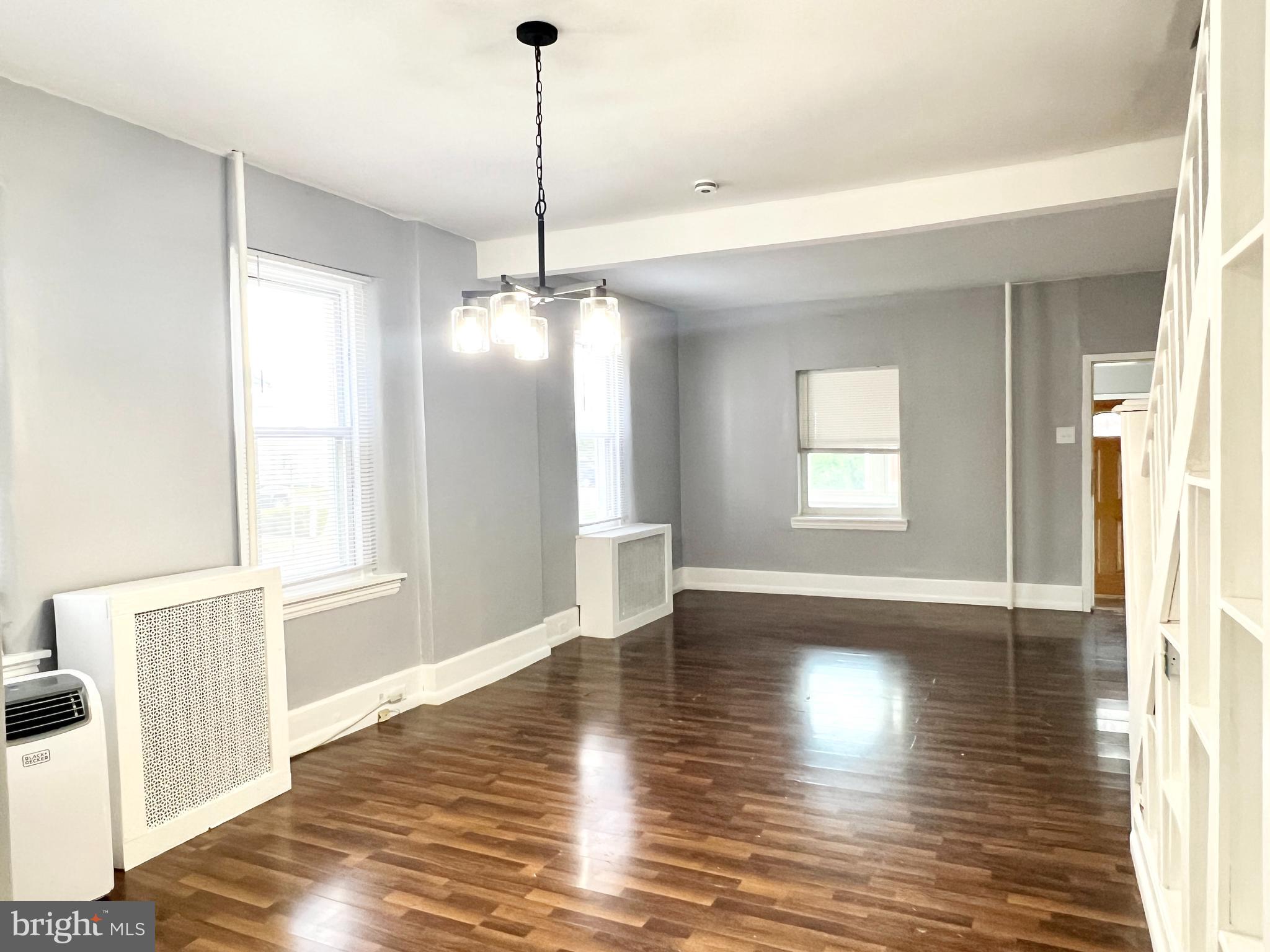 434 Pierce Street Lansdale, PA 19446 - Photo 7 of 28 a view of an empty room with wooden floor and a window