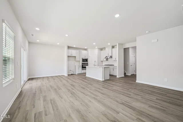 a view of kitchen with wooden floor