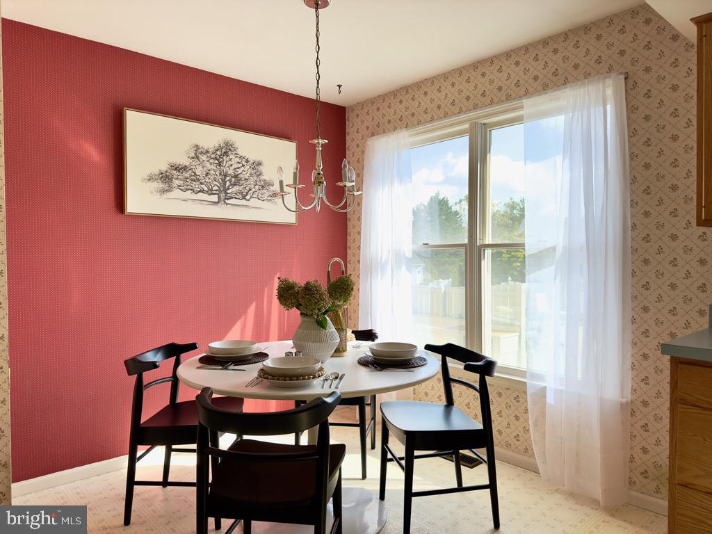 501 Deborah Drive Reading, PA 19608 - Photo 11 of 58 a view of a dining room with furniture window and wooden floor