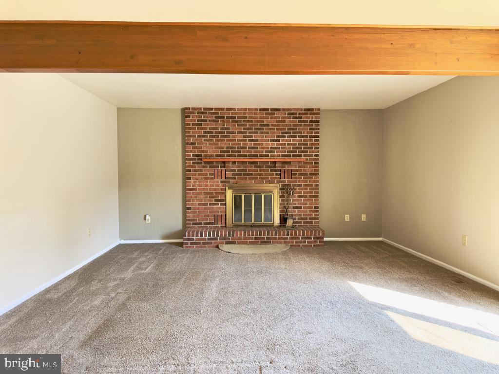 501 Deborah Drive Reading, PA 19608 - Photo 20 of 58 an empty room with a fireplace