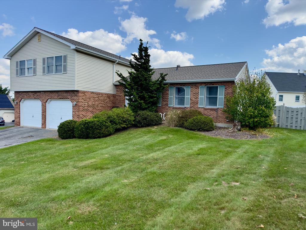 501 Deborah Drive Reading, PA 19608 - Photo 2 of 58 a front view of a house with garden