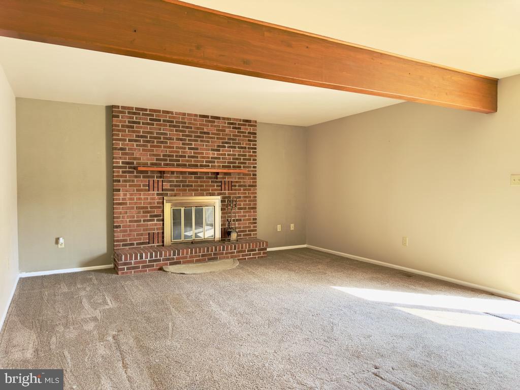 501 Deborah Drive Reading, PA 19608 - Photo 21 of 58 a view of an empty room with a fireplace