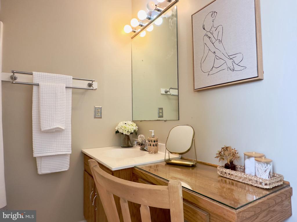 501 Deborah Drive Reading, PA 19608 - Photo 29 of 58 a bathroom with a granite countertop sink a mirror and a toilet