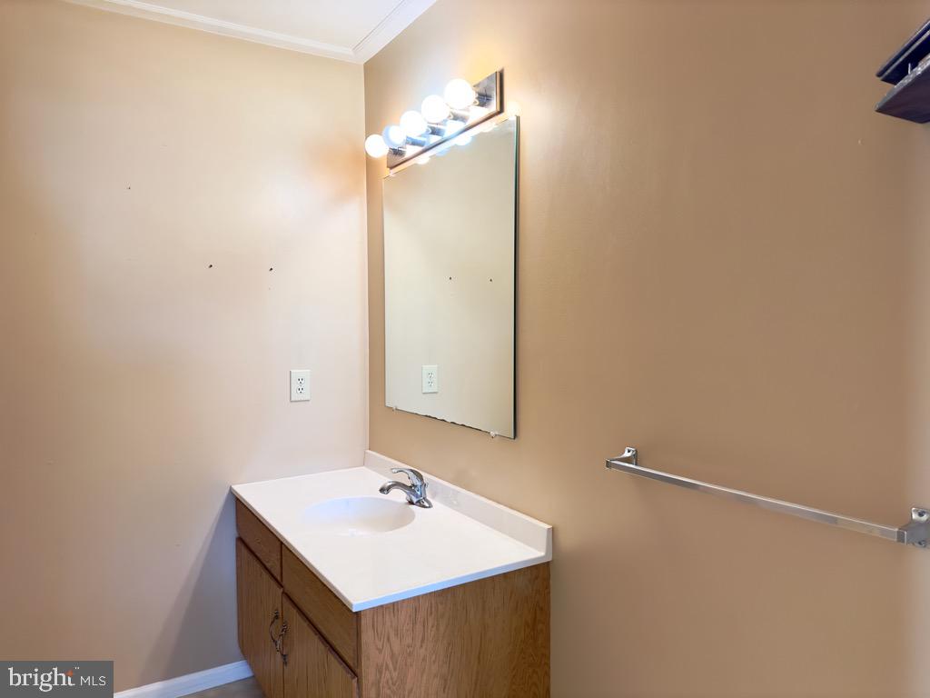501 Deborah Drive Reading, PA 19608 - Photo 32 of 58 a bathroom with a sink a mirror and a shower