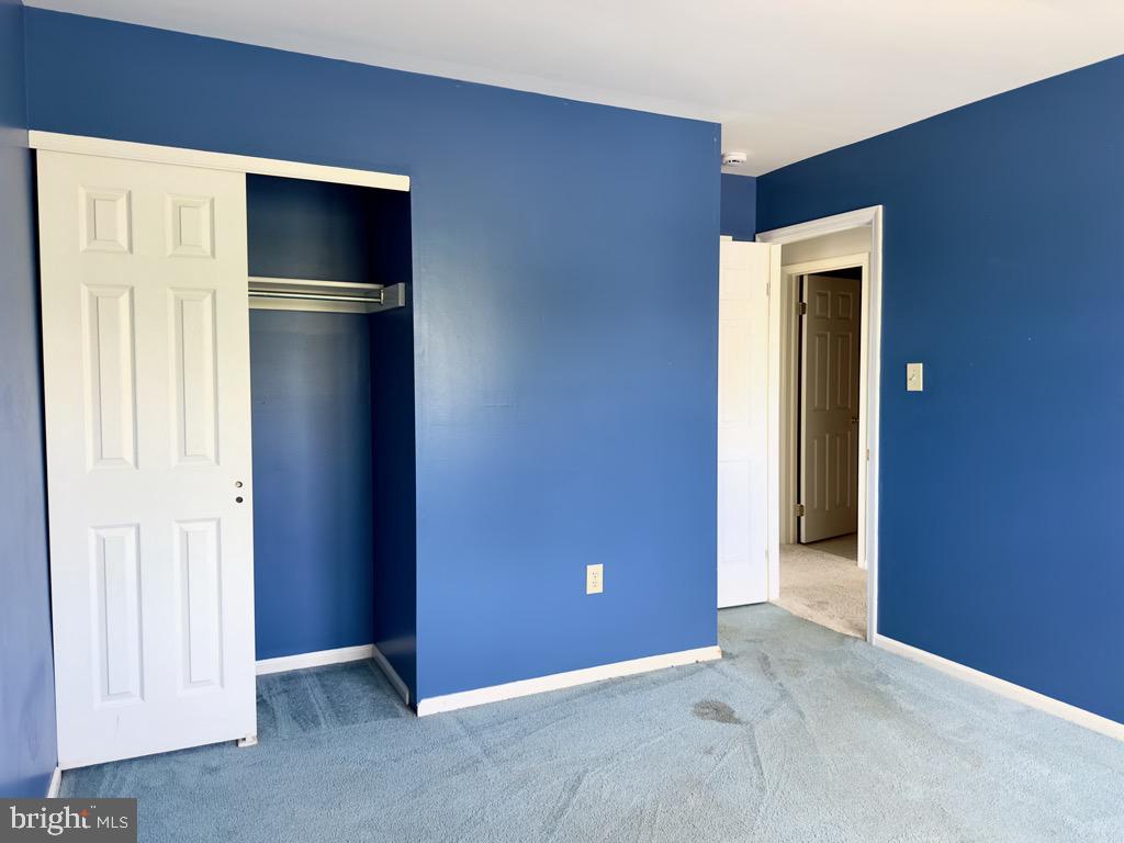 501 Deborah Drive Reading, PA 19608 - Photo 40 of 58 a view of an empty room with closet and wooden floor