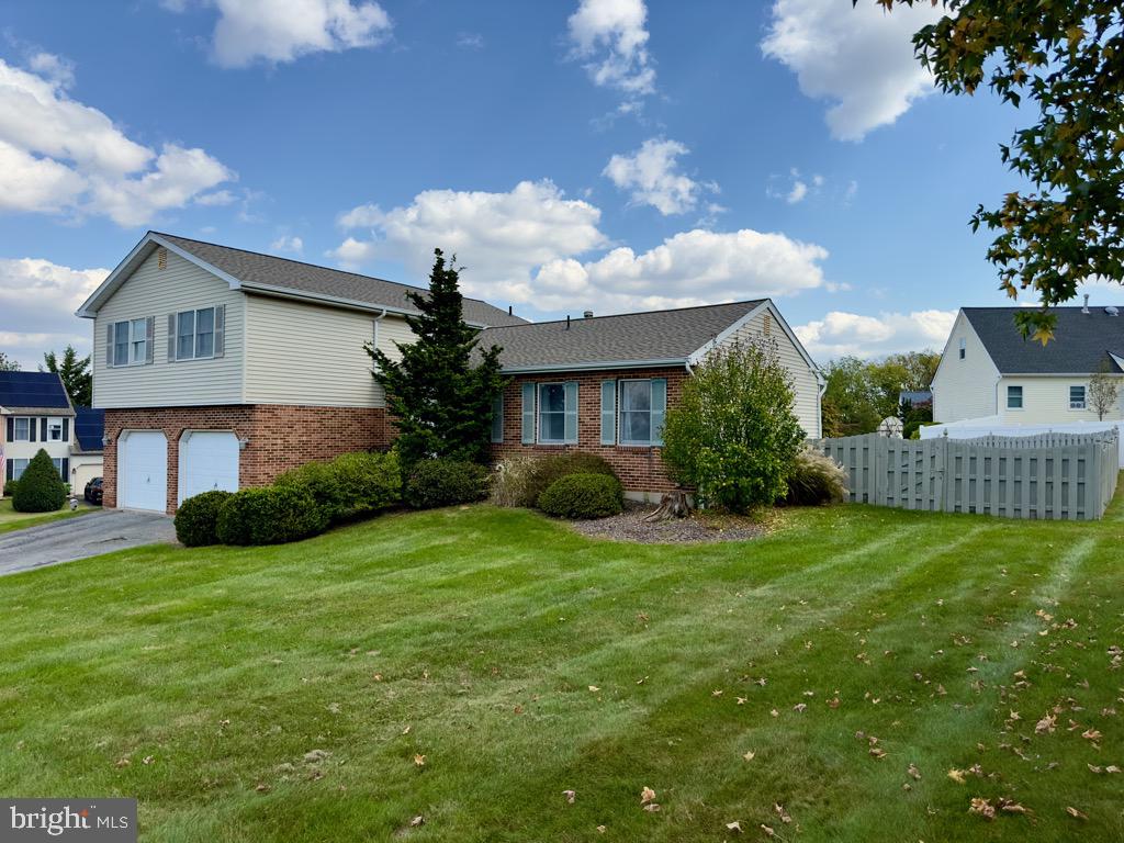 501 Deborah Drive Reading, PA 19608 - Photo 50 of 58 a view of a house with a yard and a porch