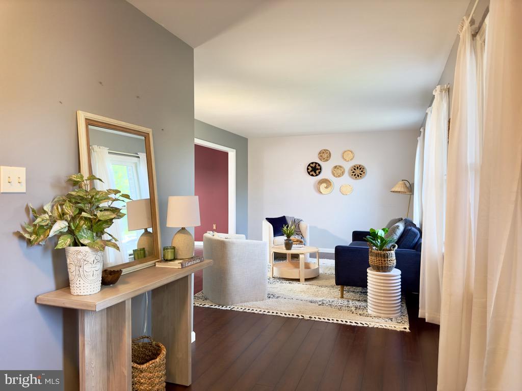 501 Deborah Drive Reading, PA 19608 - Photo 7 of 58 a living room with furniture and flowers