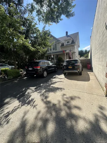 a car parked in front of a house