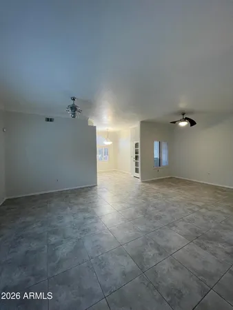 a view of a big room with windows