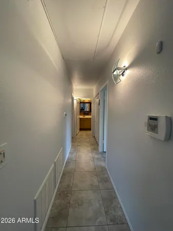 a view of hallway with stairs