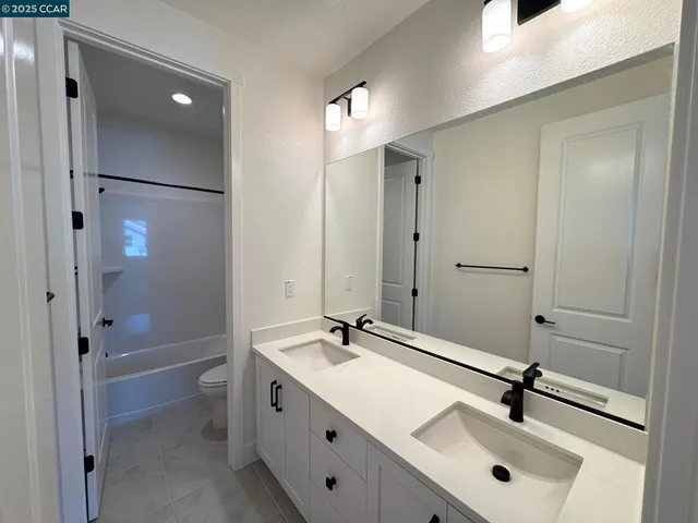 a view of a glass door with a balcony