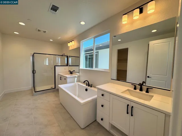 a large white building with glass door